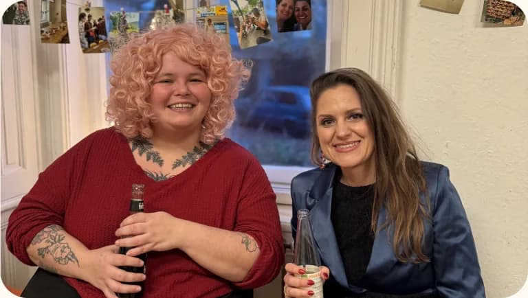 Two colleagues smiling together